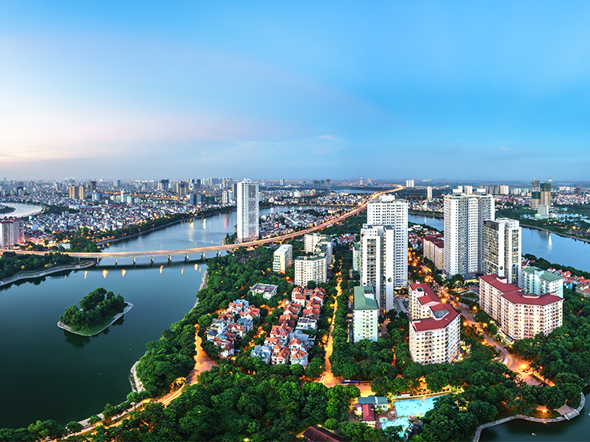 Aerial view of Hanoi, Vietnam at dusk with high-rise buildings