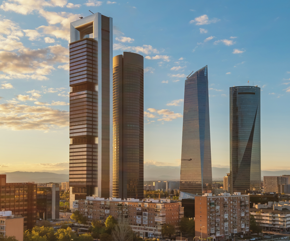 Sunset view of the Cuatro Torres Business Area in Madrid