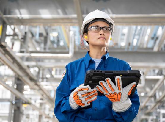 LYB engineer working on a tablet representing innovation and smarter product design.